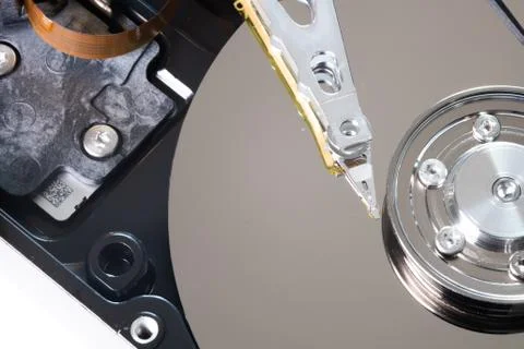 Hard drive from the computer hdd with mirror effect. Close-up, macro. Stock Photos