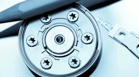 Hard drive platter showing read write head and pencil Stock Footage 21308005