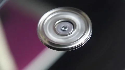 A hard drive platter starts to spin Stock Footage 161617301