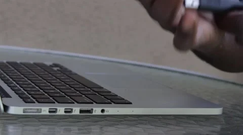 Hard Drive Plug into Laptop before Typing Stock Footage 50695427