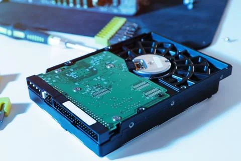 Hard drive on table. Computer repair service Stock Photos