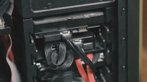 Hard drives in the computer case. Assembly of the system unit. Video stock 316735012