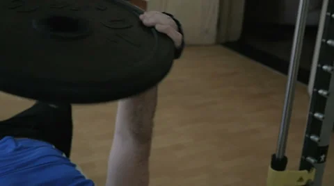 Hard exercise with weight disk Video stock 52057966