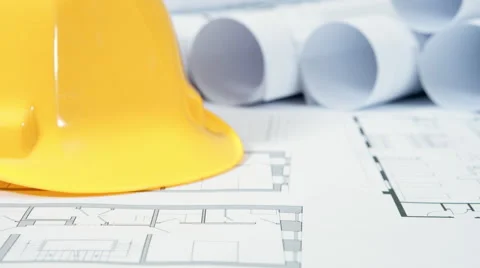 Hard hat and architectural drawings Stock Footage 60605481