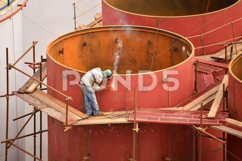 Hard job. Construction and manufacturing Stock Photos