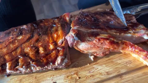 Hard meat on the ribs is inconvenient to cut off trying to cut off learning how Stock Footage 247353452