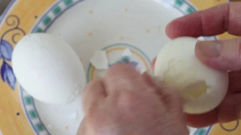 Hard to peel boiled egg Stock Footage 108801189