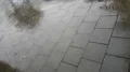 Hard rain from thunderstorm on footpath in Brunswick city Germany 4k or 4k+ Resolution