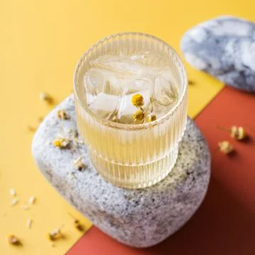 Hard seltzer cocktail with chamomile and ice Stock Photos