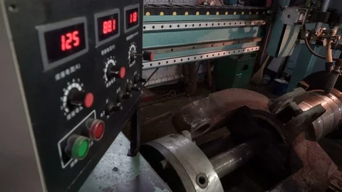 Hard surfacing by submerge arc welding process. The mechanic twists the handle Stock Footage 75312931