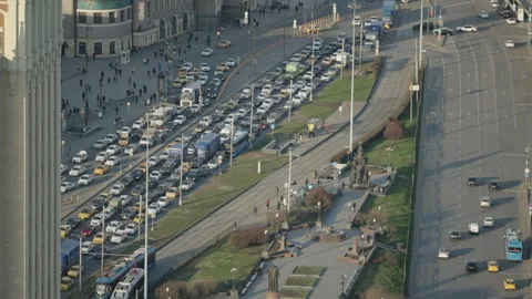 A hard traffic jam during rush hour near the station. Top view of a dense 動画素材 256016174