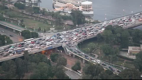 Hard traffic, road junction, evening in Cairo. Aerial view 動画素材 10006549