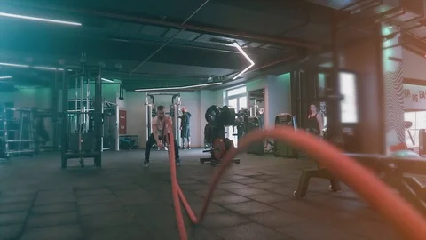 Hard training of handsome young man with whip.  Video stock 119391229