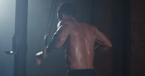 Hard training workout charismatic athletic guy tired after the workout walking Stock Footage 125479165