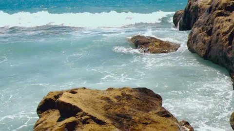 Hard waves over seaside rocks Stock Footage 882442