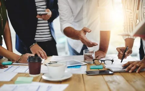 Hard work and creativity go hand in hand. a group of unrecognizable people Stock Photos