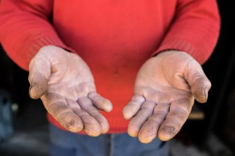 Hard work concept, hands closely, traces of work Fotos Stock