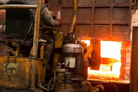 Hard work in a factory Stock Photos