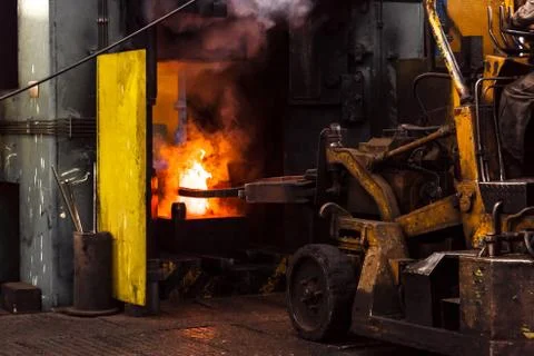 Hard work in a factory Stock Photos