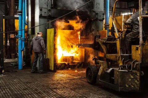 Hard work in a factory Stock Photos