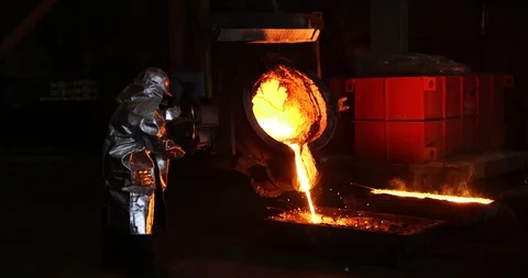 Hard work in the foundry. Pouring molten steel. Liquid steel pouring. Stock-Footage 119125260
