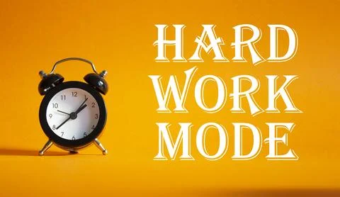 Hard Work Mode symbol. Concept word Hard Work Mode on Beautiful orange back.. Stock Photos