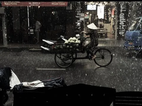 Hard work under the rain Stock Photos