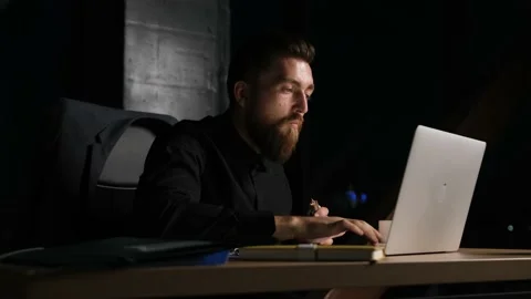 Hard worker businessman working at midnight , eating snack and drink a coffee. Stock Footage 138743395