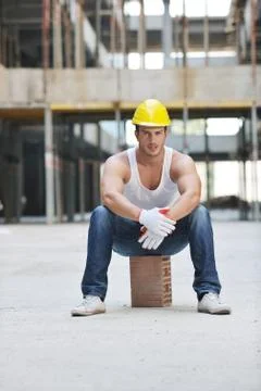 Hard worker on construction site Stock Photos