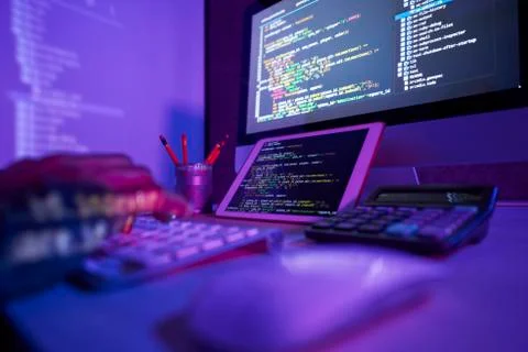 Hard worker working on computer till night Stock Photos