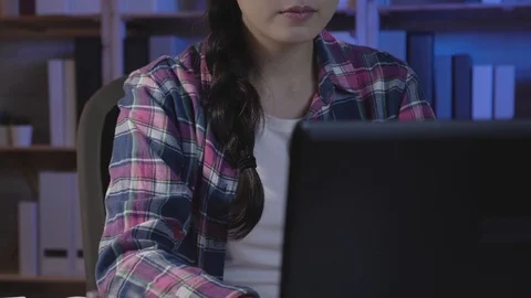 Hard working asian girl using laptop Video stock 100952814