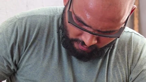 Hard working man doing his work and sweat on his face Stock Footage 161937384