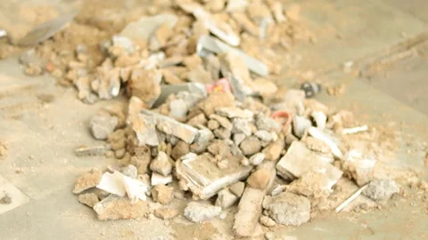 Hard working Worker, removing tiles, keeping tiles aside for recycle use. Stock Footage 245096553
