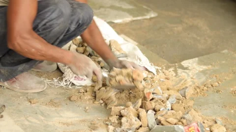 Hard working Worker, removing tiles, keeping tiles aside for recycle use. Stock Footage 245096555