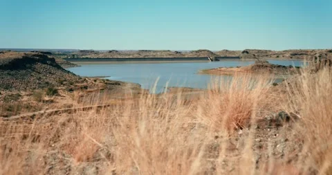Hardap Water Reservoir in Namibia with Red Grass Foreground Stock Footage 321772509