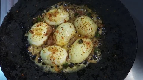 Hardboiled eggs on pan Stock Footage 73781810