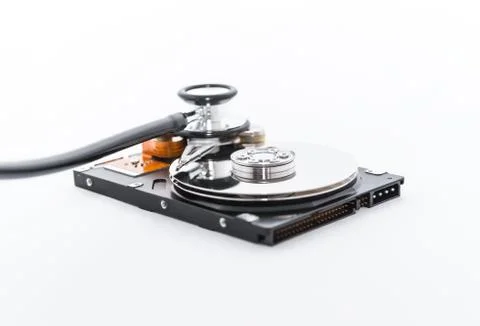 Harddisk and stethoscope Stock Photos