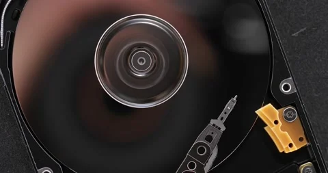 Harddisk moving head writing data on disc Stock Footage 234989101