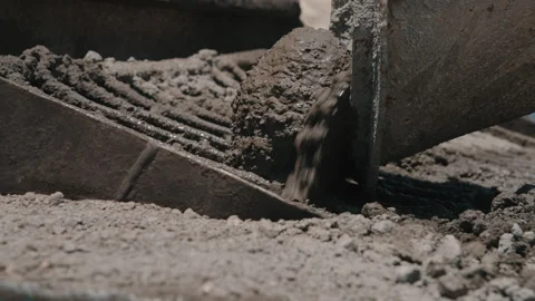 Hardened cement chunk forming in concrete mixer defect Stock Footage 303774531