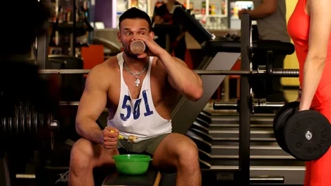 A hardened person eats after a workout Stock Footage 75375881