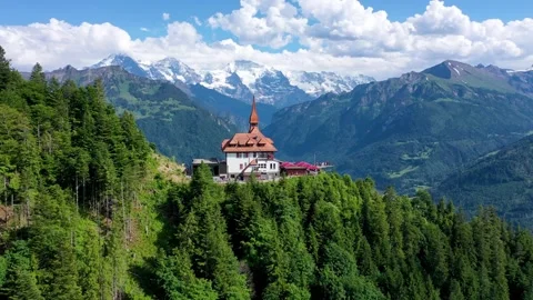 Harder Kulm surrounded by Ice caped mountains Stock Footage 247086608