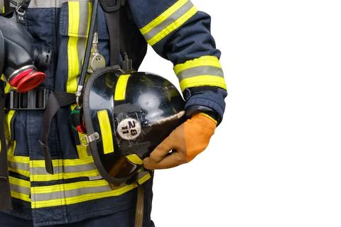 Hardhat in hand of unrecognized firefighter Stock Photos