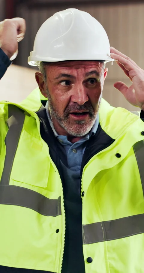 Hardhat, man and construction worker at safety training for PPE compliance with Stock Footage 340604075