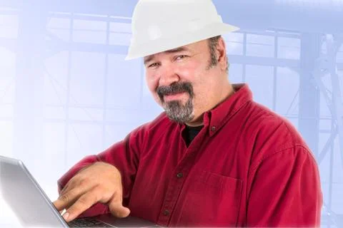 Hardhat technician smiling trustfully Stock Photos