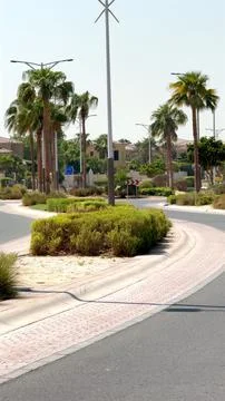 Hardscape elements blend with soft green plants to create harmony between urban Stock Photos