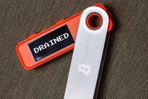 Hardware Bitcoin wallet with message drained on screen Stock Photos