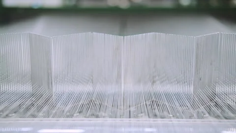 Hardware distribution of fiberglass. threads go through the conveyor. Stock Footage 203265327