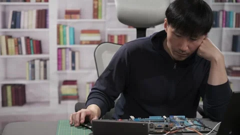 Hardware engineer programming new technology for artificial intelligence Stock Footage 295394899