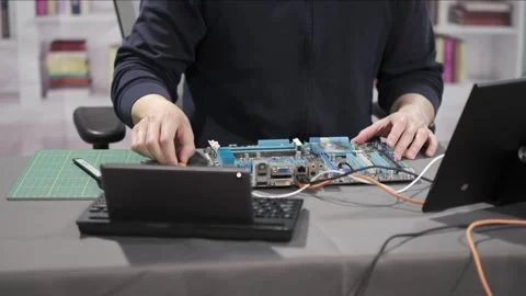 Hardware engineer programming new technology for artificial intelligence Stock Footage 295394900