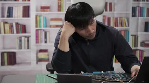 Hardware engineer programming new technology for artificial intelligence Stock Footage 295394902